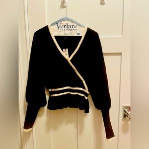 Black peplum sweater